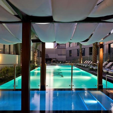 Damac Maison The Vogue Ντουμπάι Εξωτερικό φωτογραφία The pool at the hotel