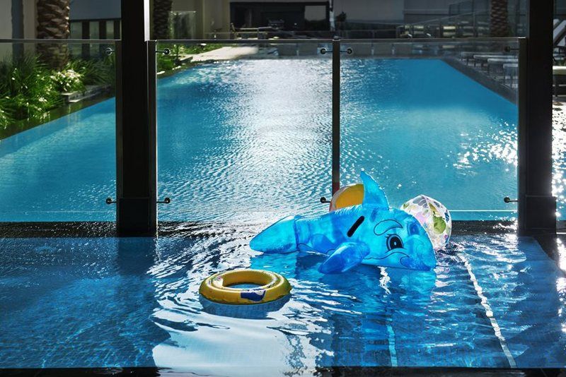 Damac Maison The Vogue Ντουμπάι Εξωτερικό φωτογραφία The swimming pool at the Ritz-Carlton, Singapore