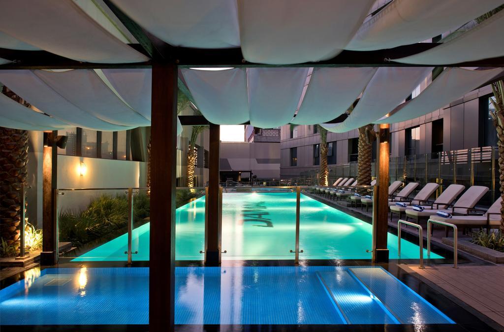 Damac Maison The Vogue Ντουμπάι Εξωτερικό φωτογραφία The pool at the hotel