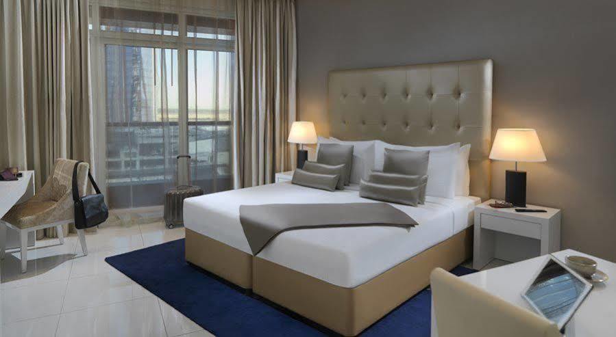 Damac Maison The Vogue Ντουμπάι Εξωτερικό φωτογραφία A bedroom at the hotel