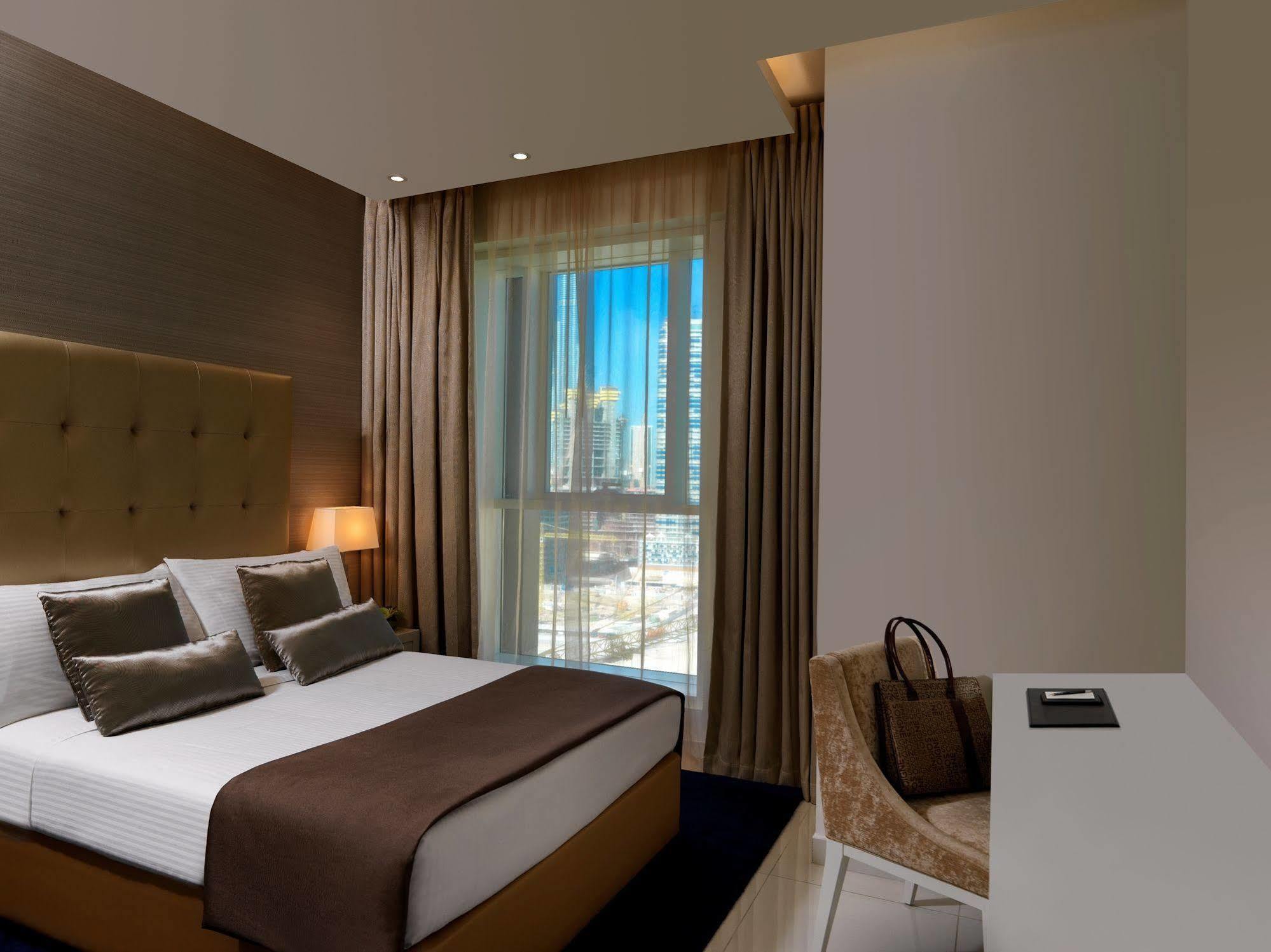 Damac Maison The Vogue Ντουμπάι Εξωτερικό φωτογραφία A bedroom at the hotel
